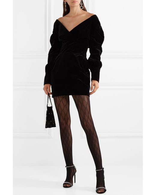Black Gucci tights in combination with black long sleeve