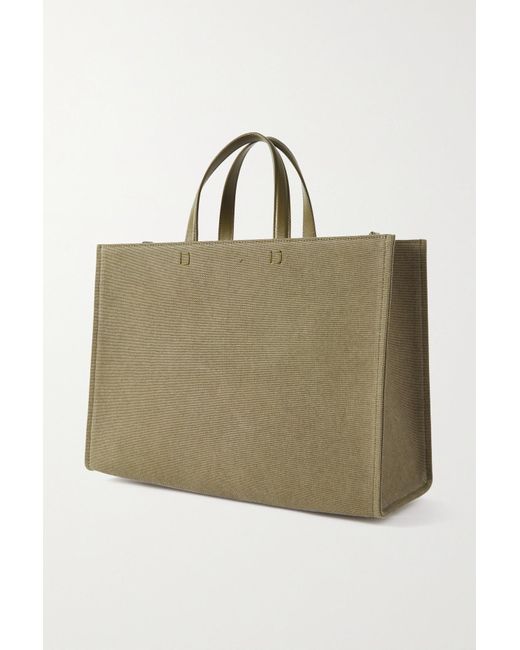 G-Tote medium leather-trimmed embossed printed coated-canvas tote