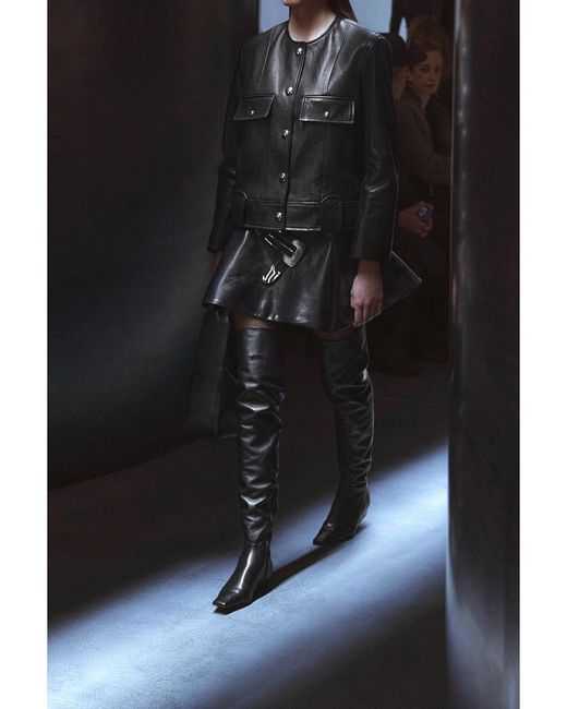 Khaite Black Rafla Pleated Leather Mini Skirt