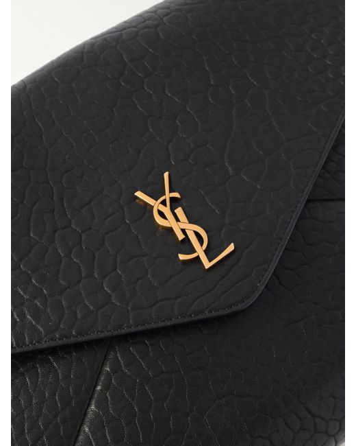 Pochette En Cuir Texturé Cassandre Large Saint Laurent en coloris Black