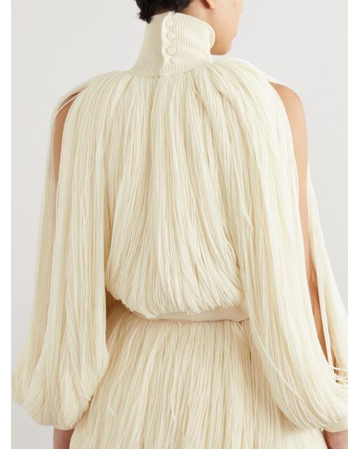 Alaïa Natural Fringed Wool-Blend Turtleneck Top