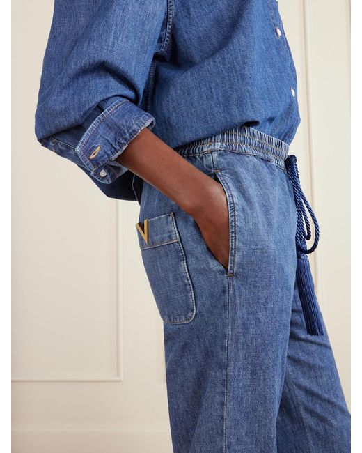 Valentino Garavani Blue Tasseled High-Rise Bootcut Jeans