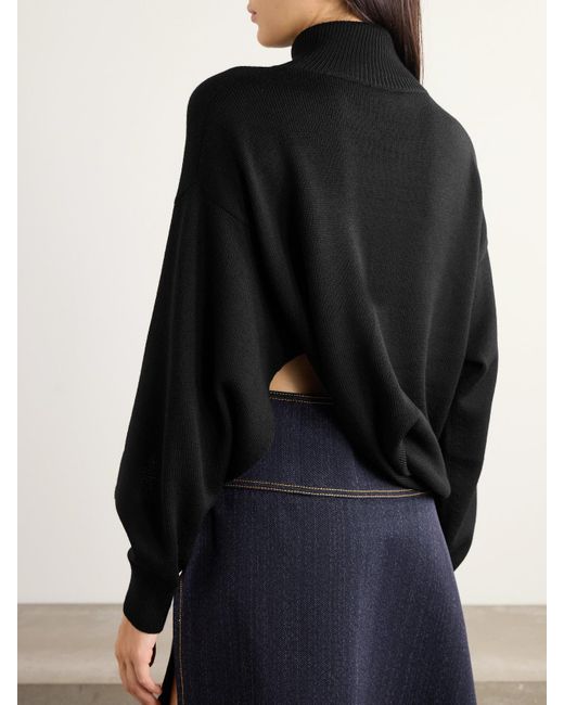 Alaïa Black Asymmetric Wool Turtleneck Sweater