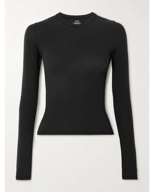 https://cdna.lystit.com/520/650/n/photos/net-a-porter/527d995e/skims-Black-Fits-Everybody-Long-Sleeve-T-shirt.jpeg