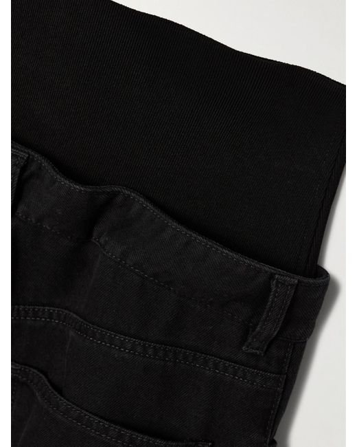 Jean En Coton Mélangé À Finitions En Mailles Stretch Alaïa en coloris Black