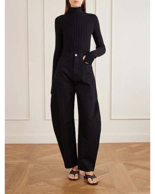 Alaïa Black Fishnet Flat Sandals