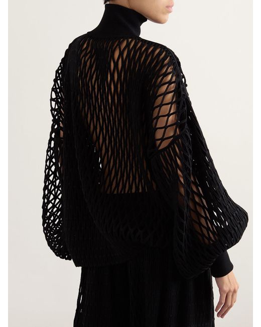 Alaïa Black Oversized Open-Knit Turtleneck Sweater