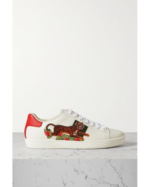 sneakers in leather with webbing