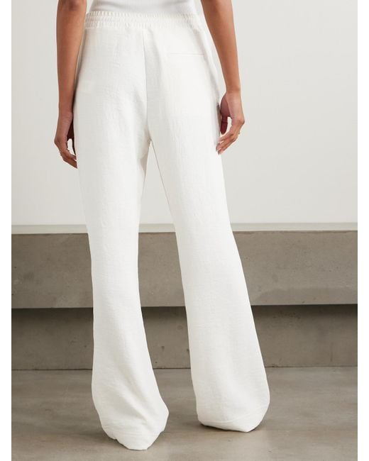 J.W. Anderson White Tech-Jersey Flared Track Pants