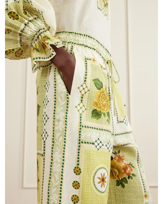 ALÉMAIS Metallic Dixie Knotted Floral-Print Linen Pants