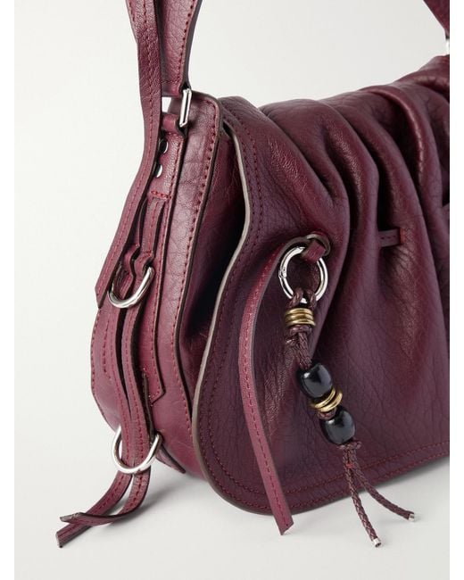 Isabel Marant Purple Bolton Embellished Tasseled Textured-Leather Shoulder Bag