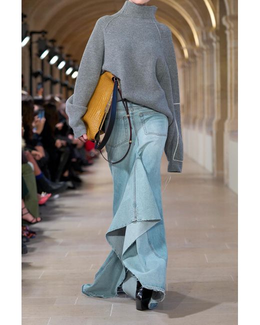 Victoria Beckham Asymmetric Paneled Frayed Denim Maxi Skirt in
