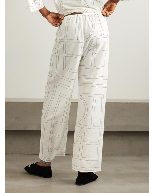 Pantalon Large En Coton Biologique Et Soie Mélangés À Broderies Totême  en coloris White
