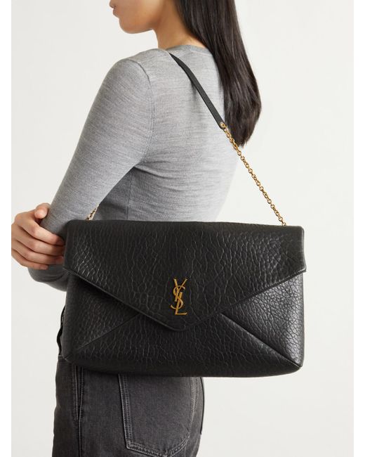 Pochette En Cuir Texturé Cassandre Large Saint Laurent en coloris Black