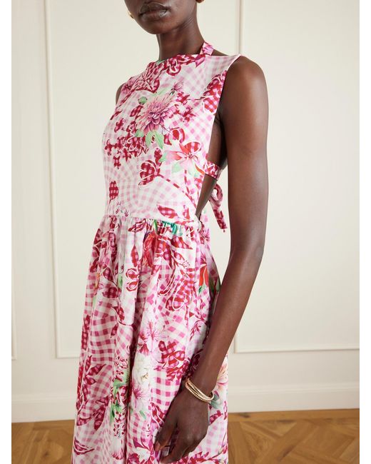 kat printed midi dress From garden parties to Mother's Day brunch, the Kat Midi Dress suits every age and every occasion. Flutter sleeves bring the charm while the tiered skirt brings just the right amount of