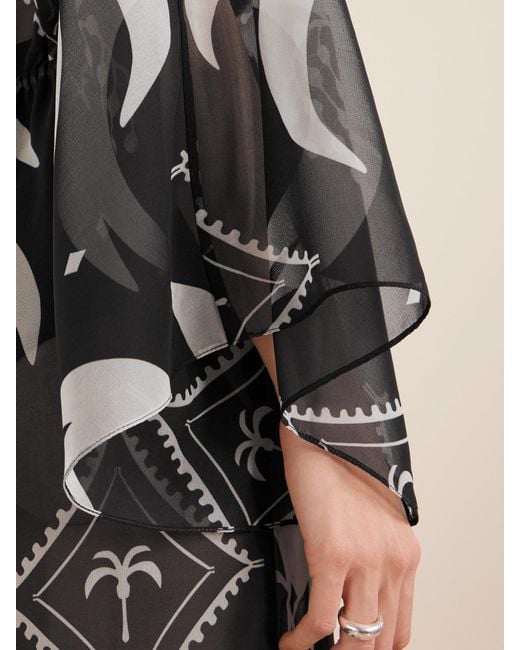 Robe Longue En Mousseline Imprimée Johanna Ortiz en coloris Black