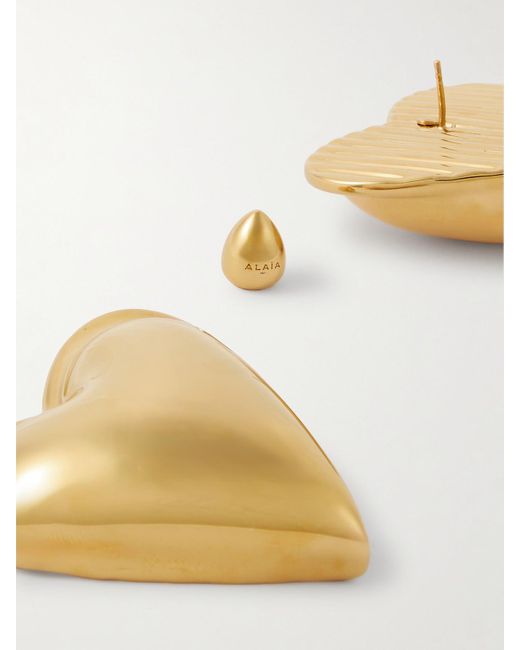 Alaïa White Bombe Goldfarbene Ohrringe