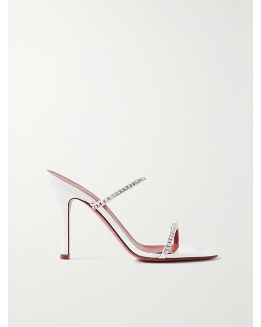 Mules En Cuir Verni À Cristaux Gilda AMINA MUADDI en coloris White