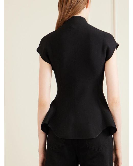Khaite Black Andra Stretch-Knit Turtleneck Peplum Top