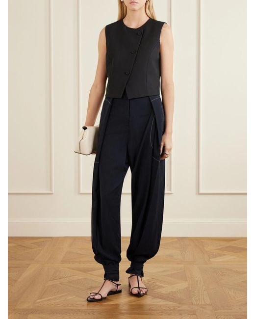 Sharon Wauchob Blue Arch Topstitched Paneled Pleated Wool-Twill Tapered Pants