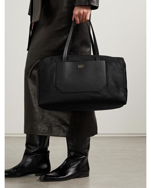 Khaite Black Sage Textured Leather-Trimmed Shell Duffle Bag
