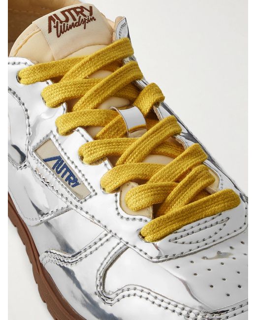 Autry Metallic Windspin Low Sneakers Aus Verspiegeltem Vinyl Mit Canvas-Besatz