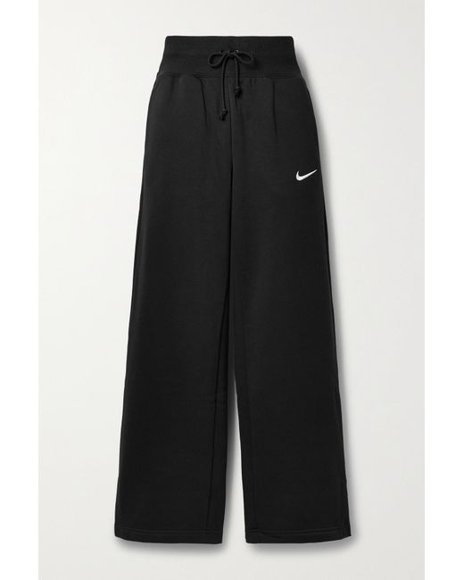 Nike Sportswear Phoenix Embroidered Cotton-blend Jersey Track Pants in ...