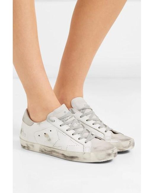 superstar distressed leather and suede sneakers
