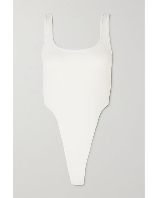 Alo Yoga Synthetic Stretch Thong Bodysuit in Ivory (White) | Lyst