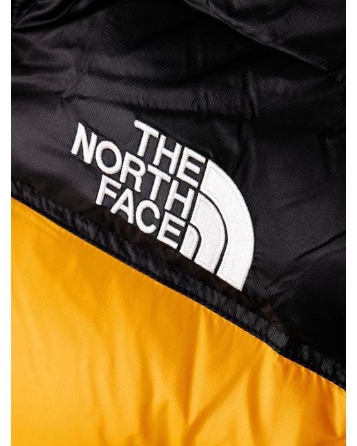 The North Face Orange Nuptse Two-Tone Cropped Quilted Shell Down Jacket