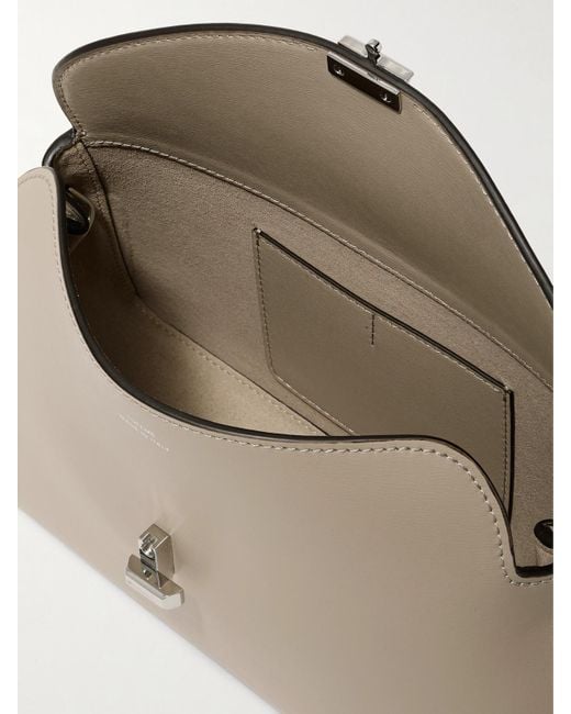 Totême  Natural T-Lock Leather Clutch