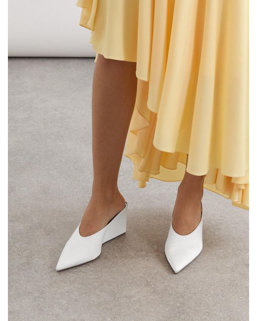 Alaïa White Satin Point-Toe Wedge Mules