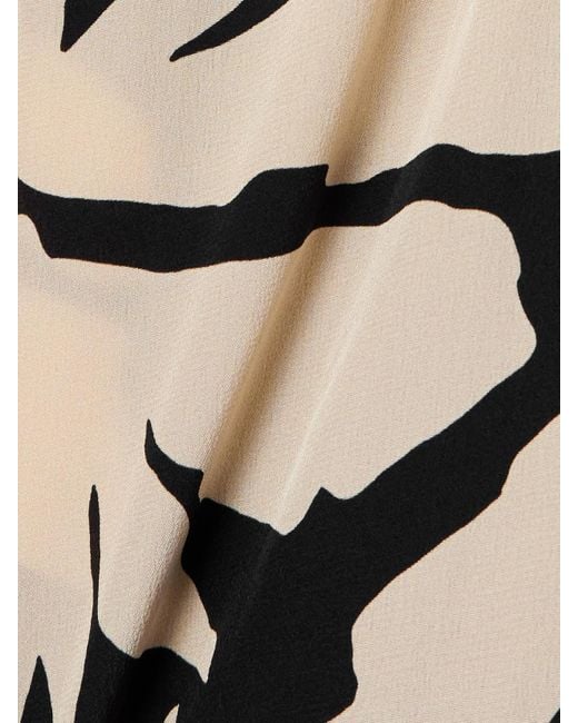 Robe Longue En Soie À Imprimé Fleuri Et À Volants Santa Cruz Johanna Ortiz en coloris White