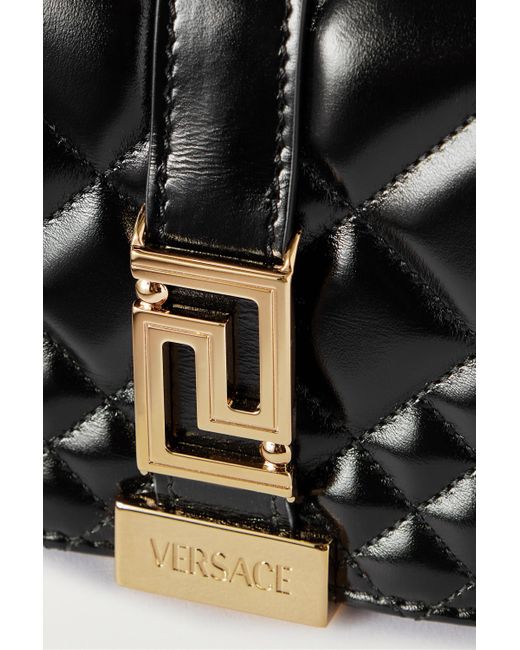 VERSACE Quilted small glossed-leather shoulder bag