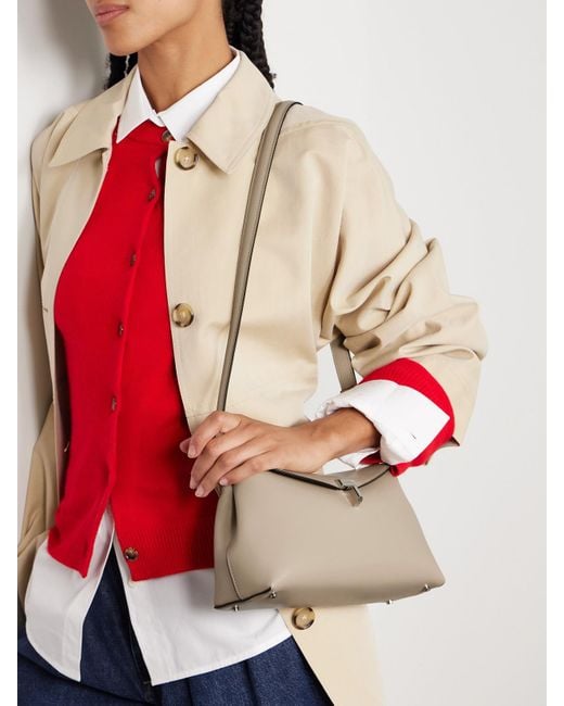 Totême  Natural T-Lock Leather Clutch