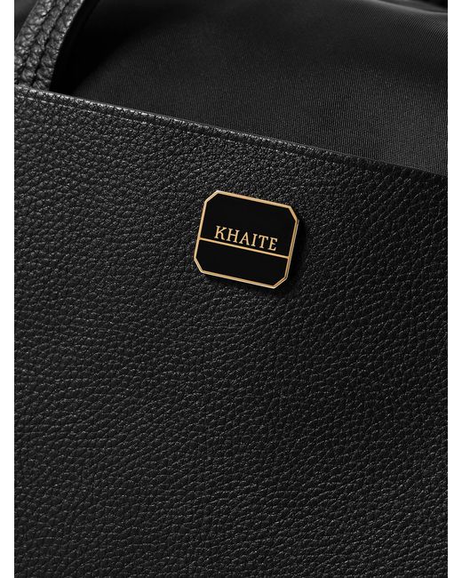 Khaite Black Sage Textured Leather-Trimmed Shell Duffle Bag