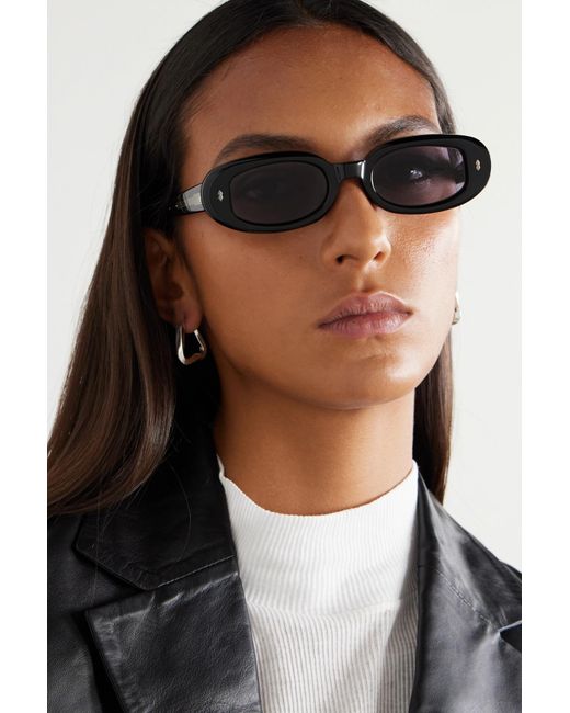 https://cdna.lystit.com/520/650/n/photos/net-a-porter/eea5d8d8/jacques-marie-mage-Black-Besset-Small-Oval-frame-Acetate-Sunglasses.jpeg