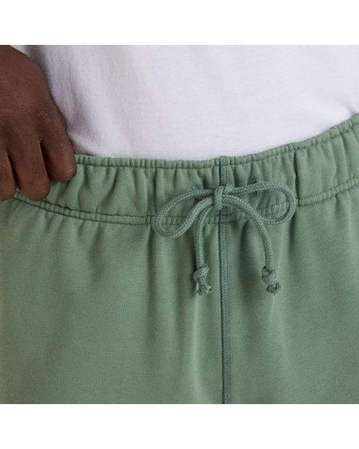 New Balance Green Athletics French Terry Short 5" for men