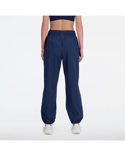 New Balance Athletics Stretch Woven jogger in het Blue