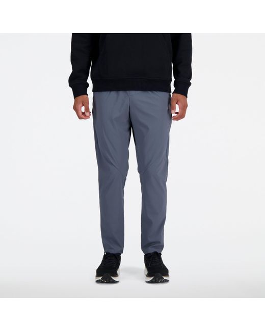 New Balance Blue Ac Tapered Pant 29" In Polywoven for men