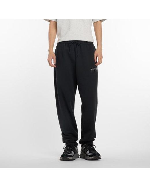 Hombre Linear Graphic Fleece Pant En, Poly Fleece, Talla New Balance de hombre de color Black