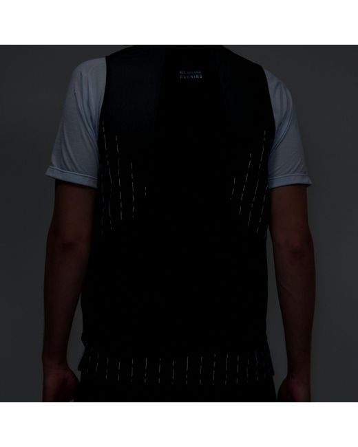 Impact run luminous packable vest in nero di New Balance in Blue da Uomo