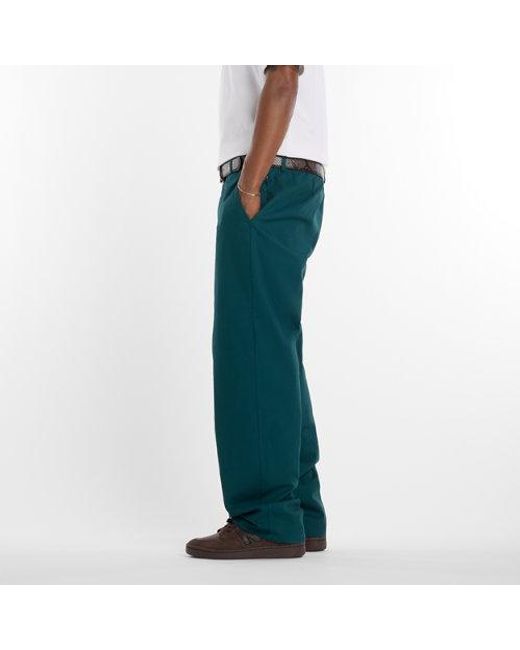 New Balance Green Numeric Standard Pant 32" for men