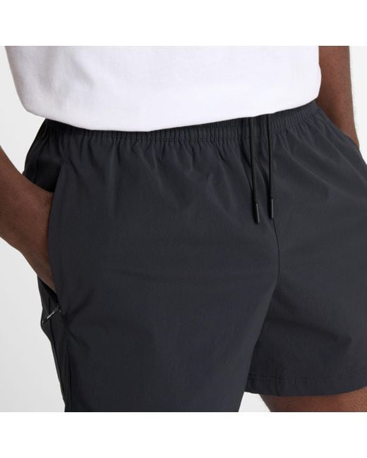 New Balance Blue Athletics Stretch Woven Short 5" In Black Polywoven for men