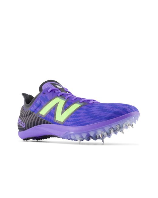 New Balance Purple Fuelcell md500 v9 in blau/schwarz