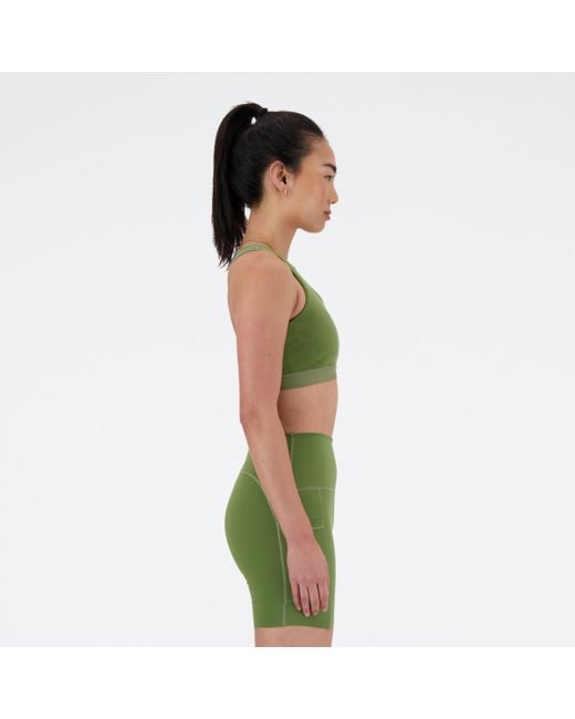 New Balance Nb Sleek Medium Support Pocket Sports Bra In Green Poly Knit