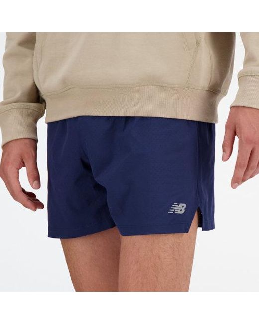 New Balance Blue 's Sports Essentials Shorts 5 Inch for men