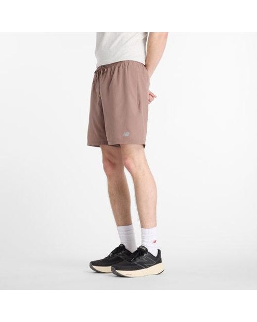 New Balance Pink Sport Essential Short 7" for men