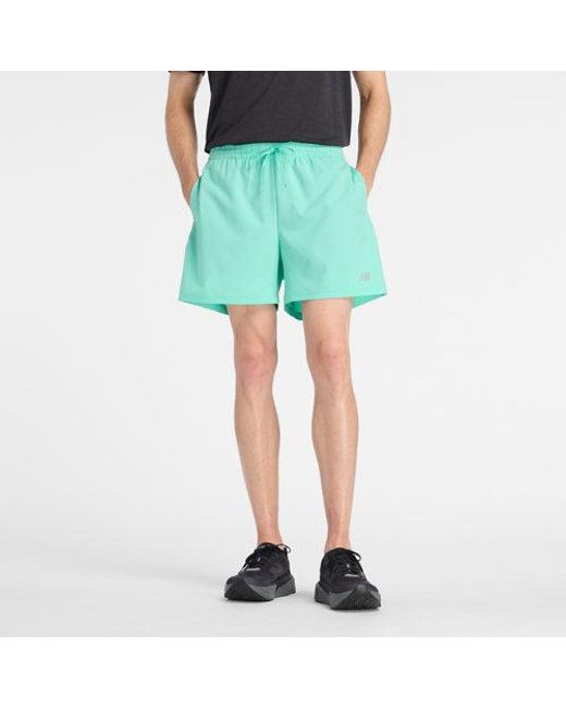 New Balance Green Sport Essential Short 5" for men
