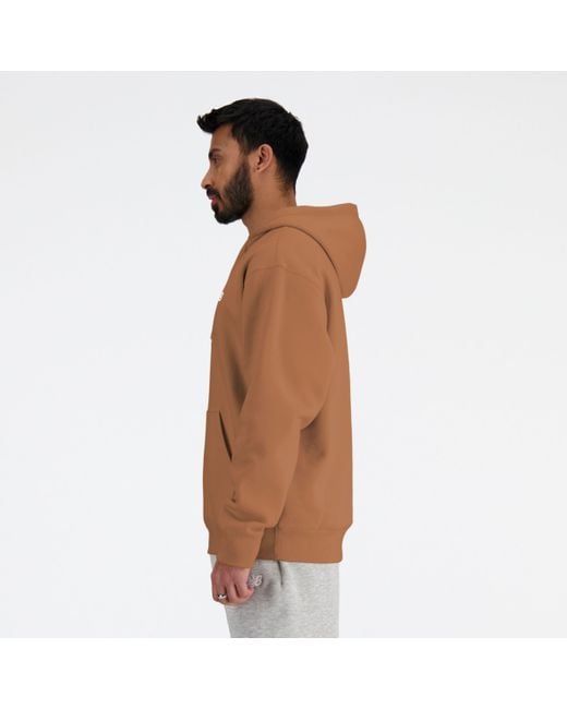 Sport essentials french terry hoodie in marrone di New Balance in Brown da Uomo